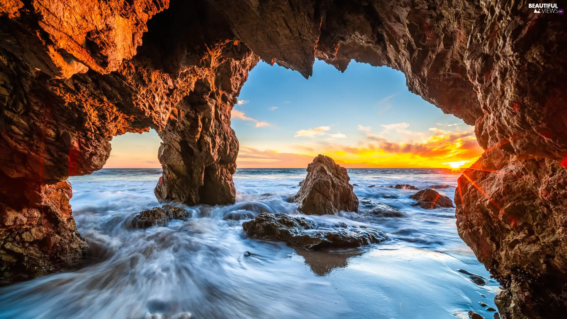 rays, sea, cave, California, rocks, Malibu, Waves, The United States, Los Angeles County, Great Sunsets