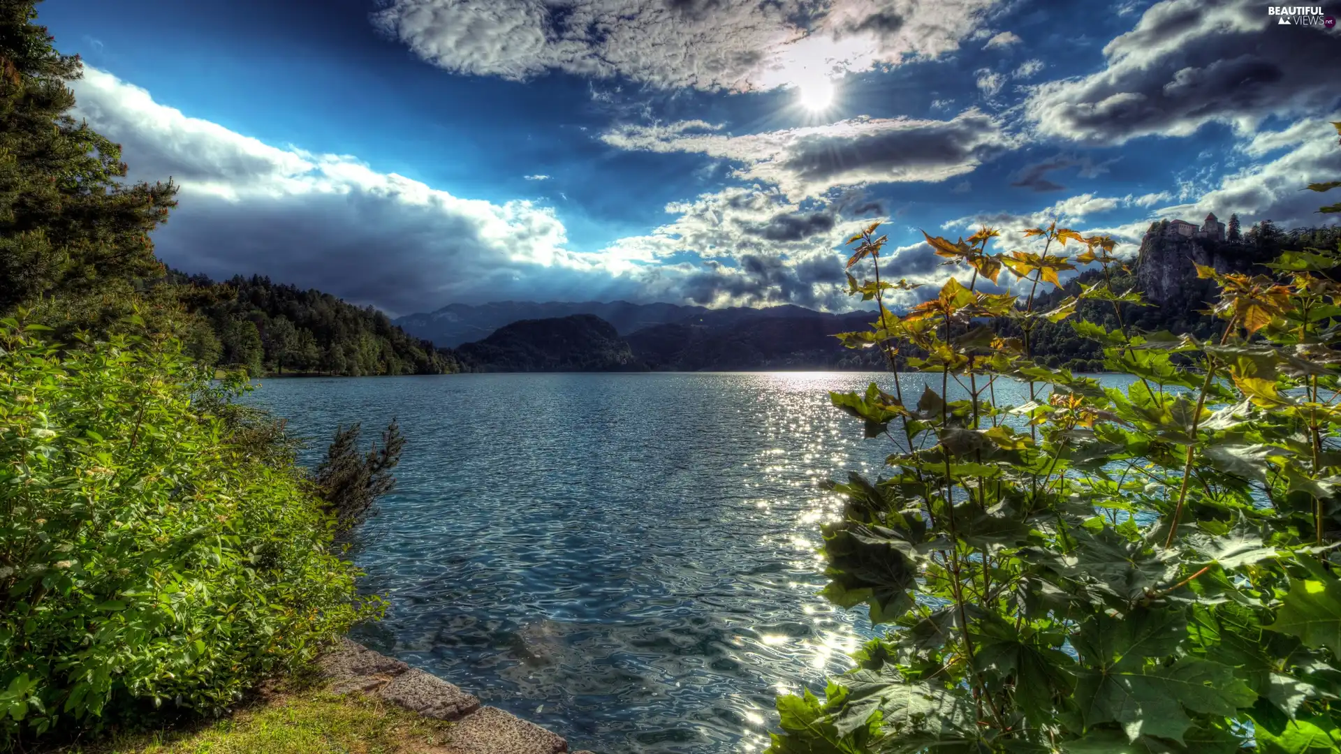 Lake Bled, Slovenia, trees, viewes, rocks, Bled Castle, Mountains, Julian Alps, rays of the Sun