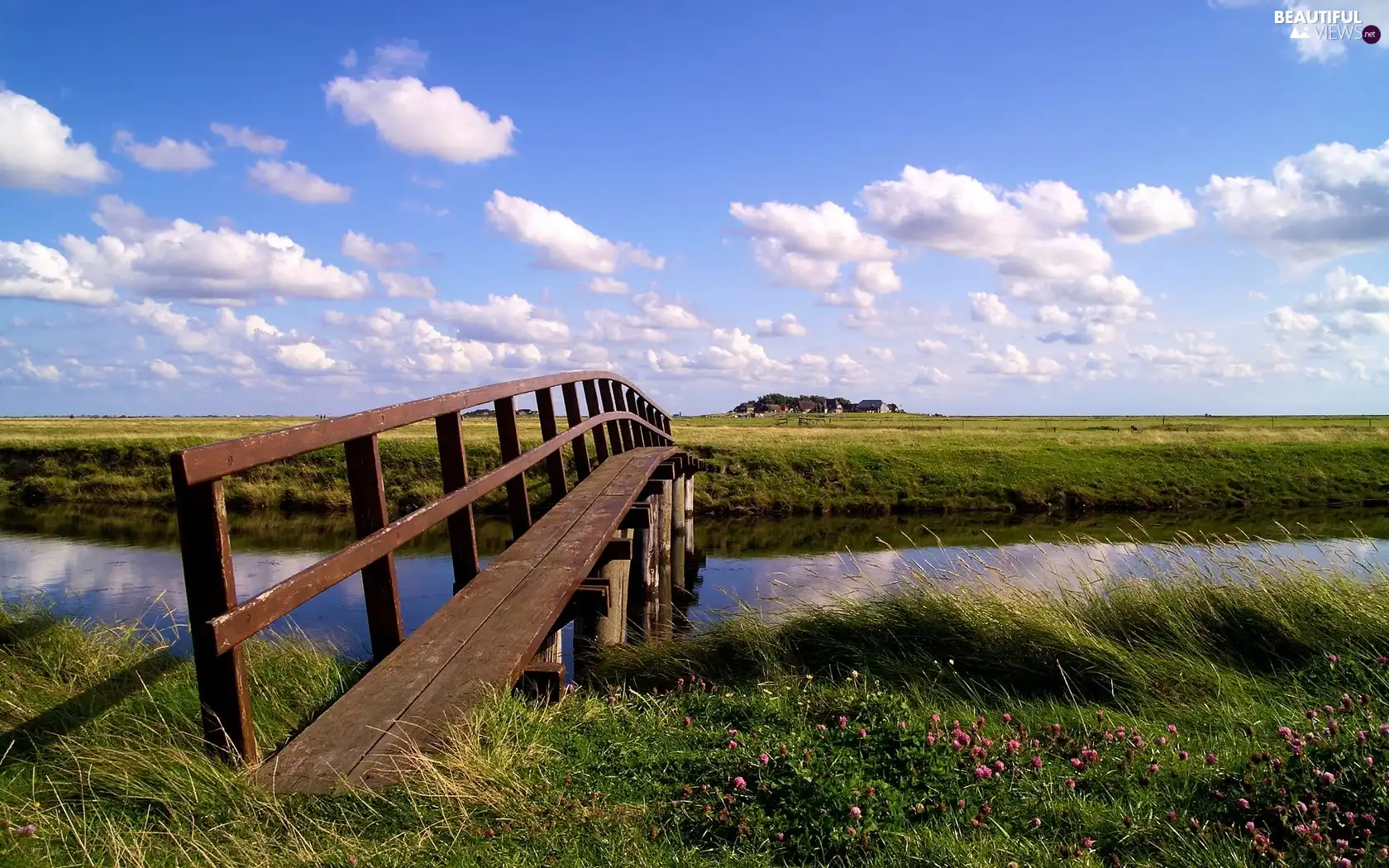 River, grass, clouds, footbridge