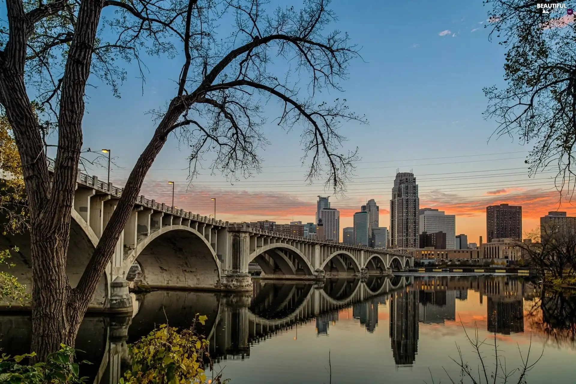 River, skyscrapers, clouds, bridge