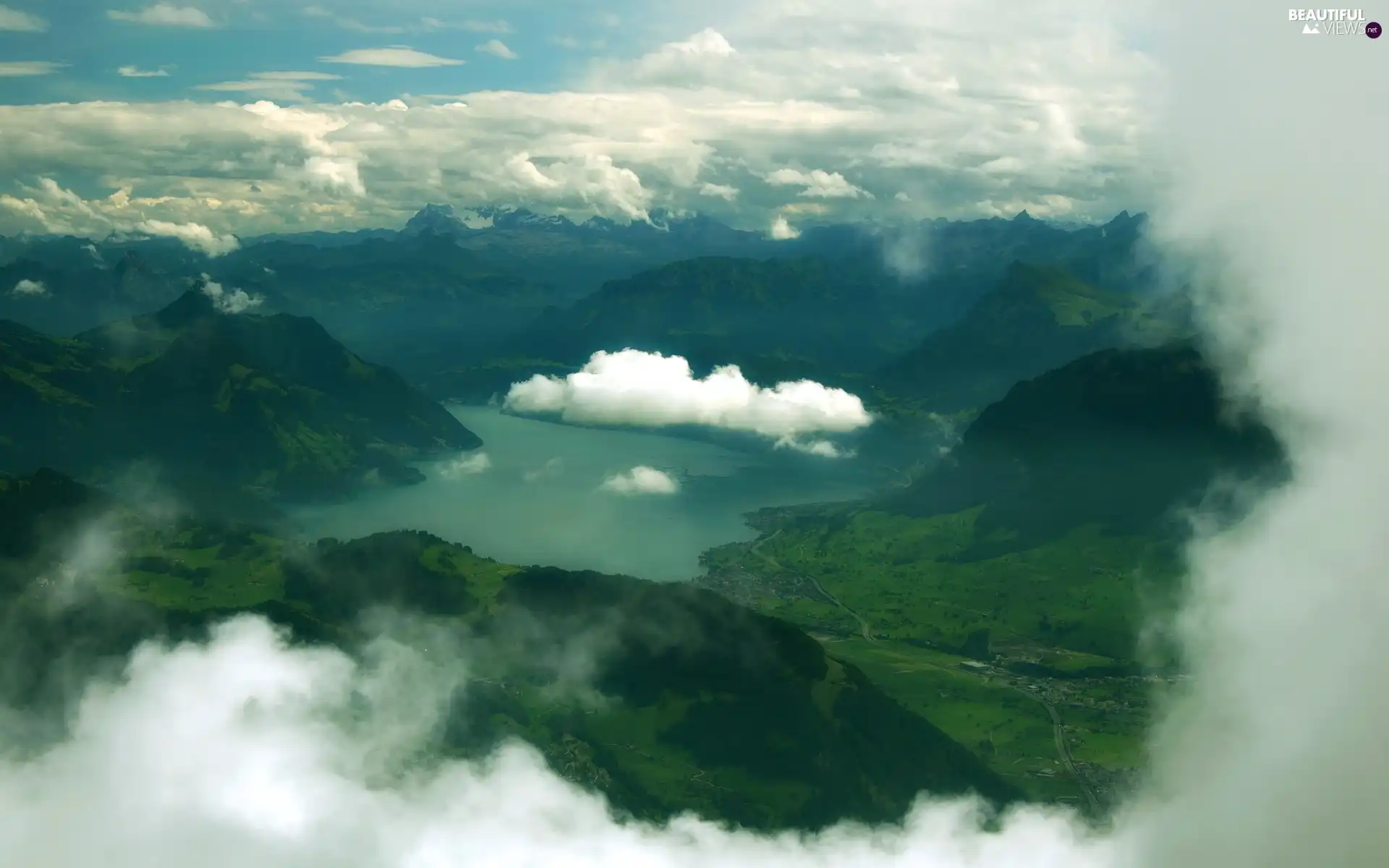 Mountains, clouds, lake