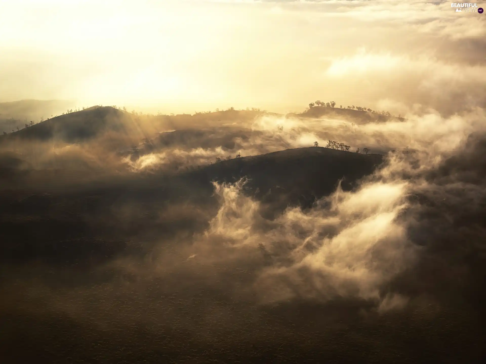 Mountains, sun, rays, clouds