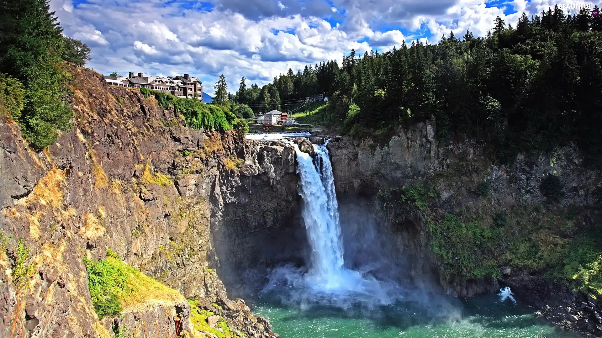 Hotel hall, waterfall, rocks