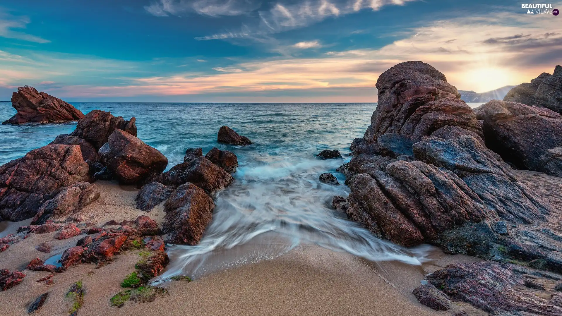 Sand, sea, rocks