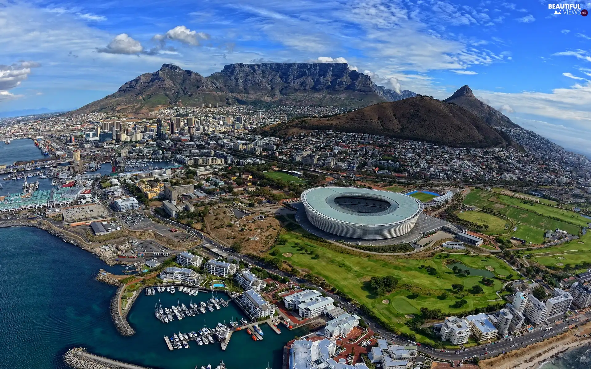 Town, Stadium, sea, Mountains