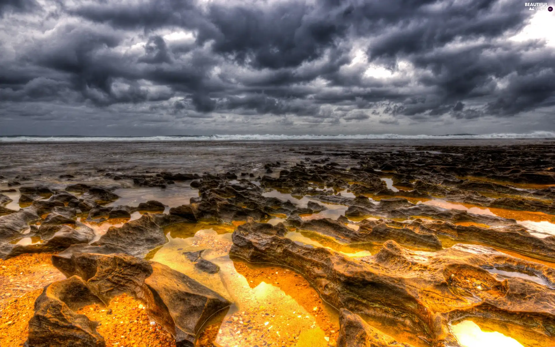 Stones, sea, clouds