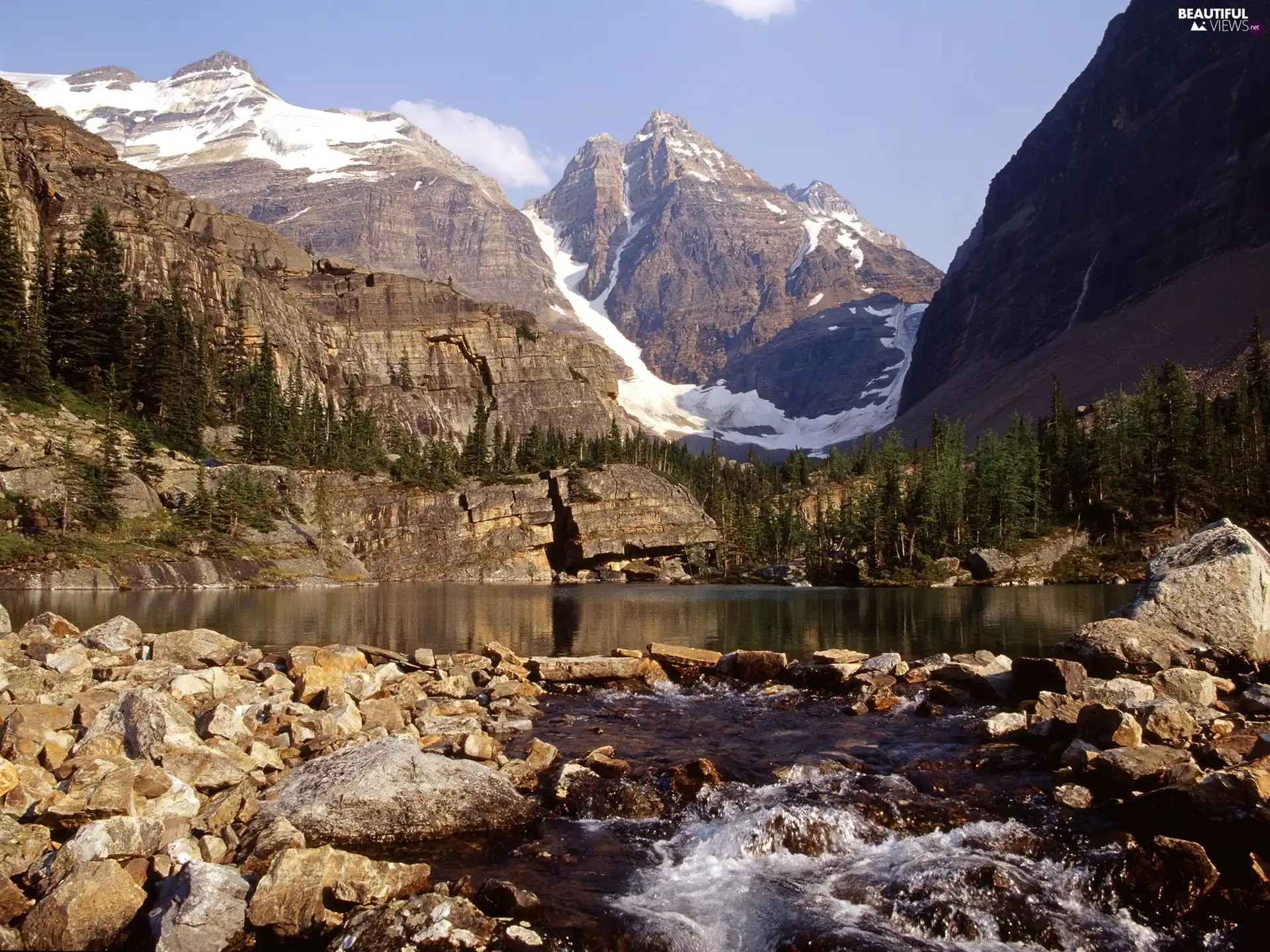 Stones, mountains, lake