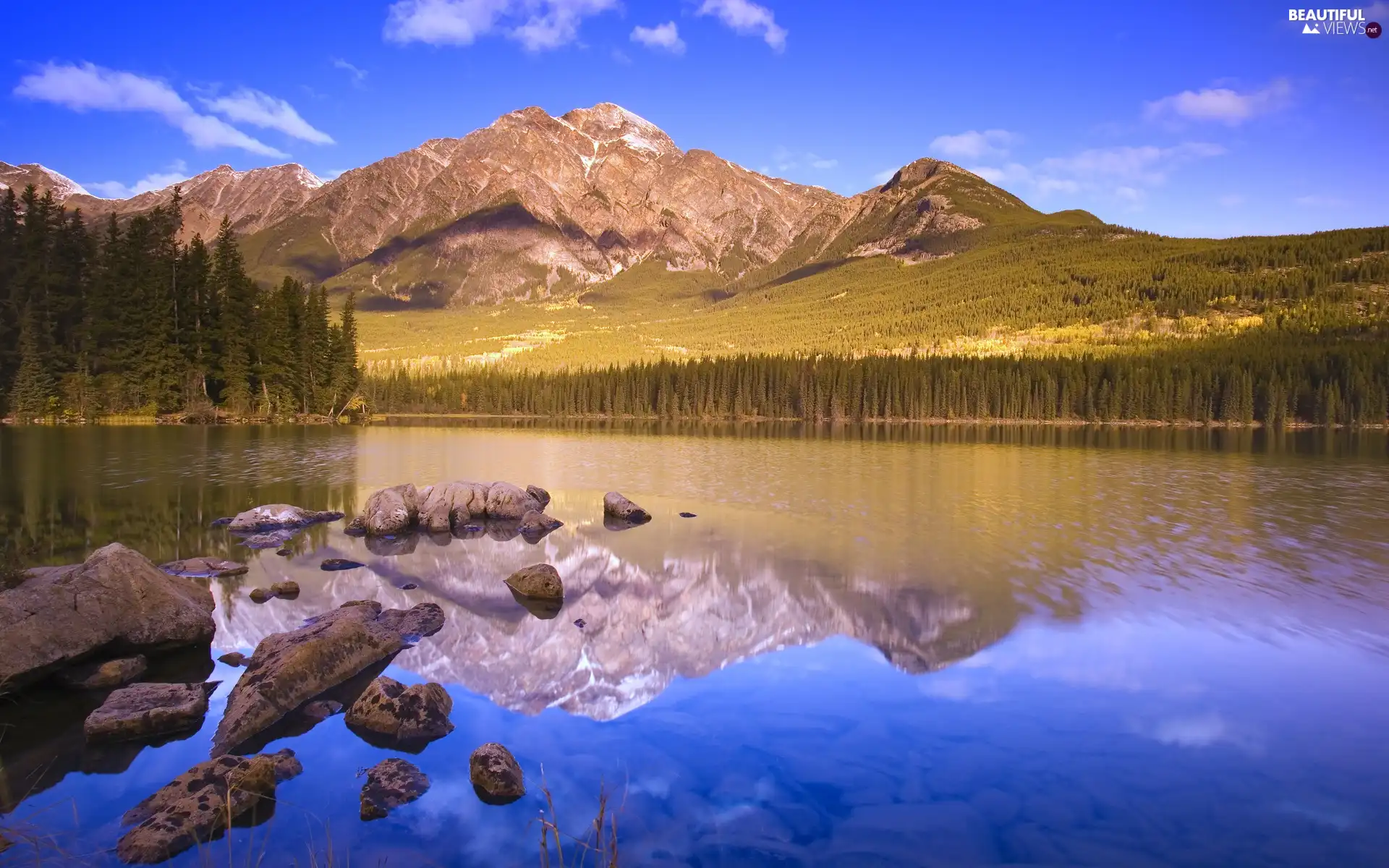 Stones, mountains, lake