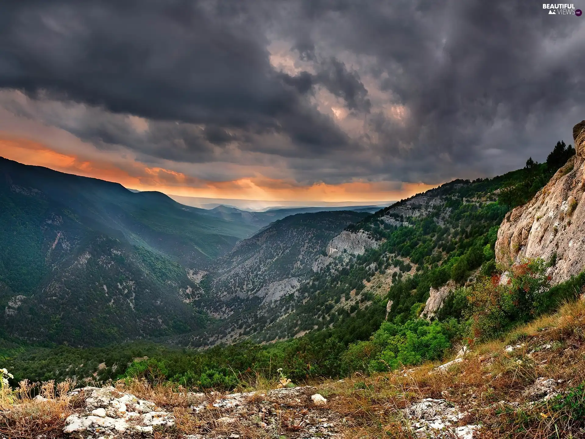 Mountains, west, sun, clouds