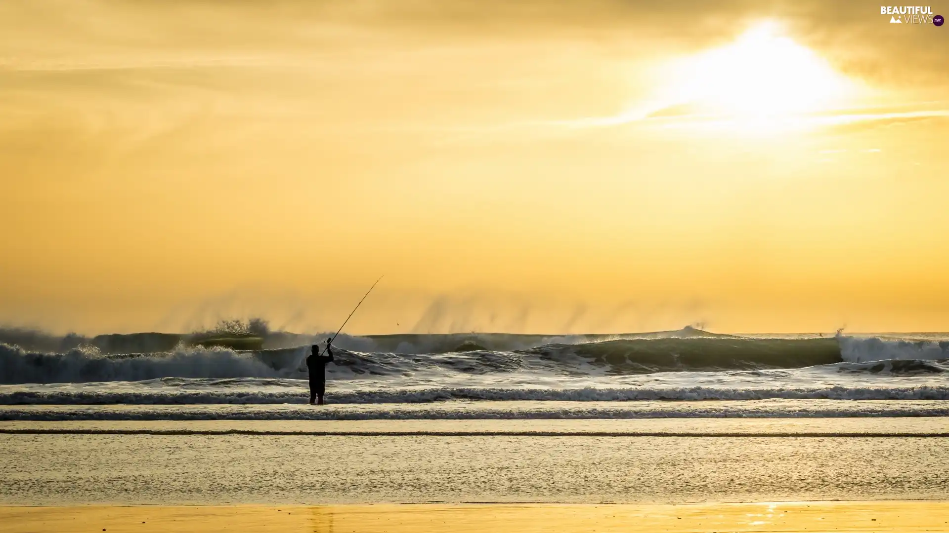 Sunrise, sea, angler