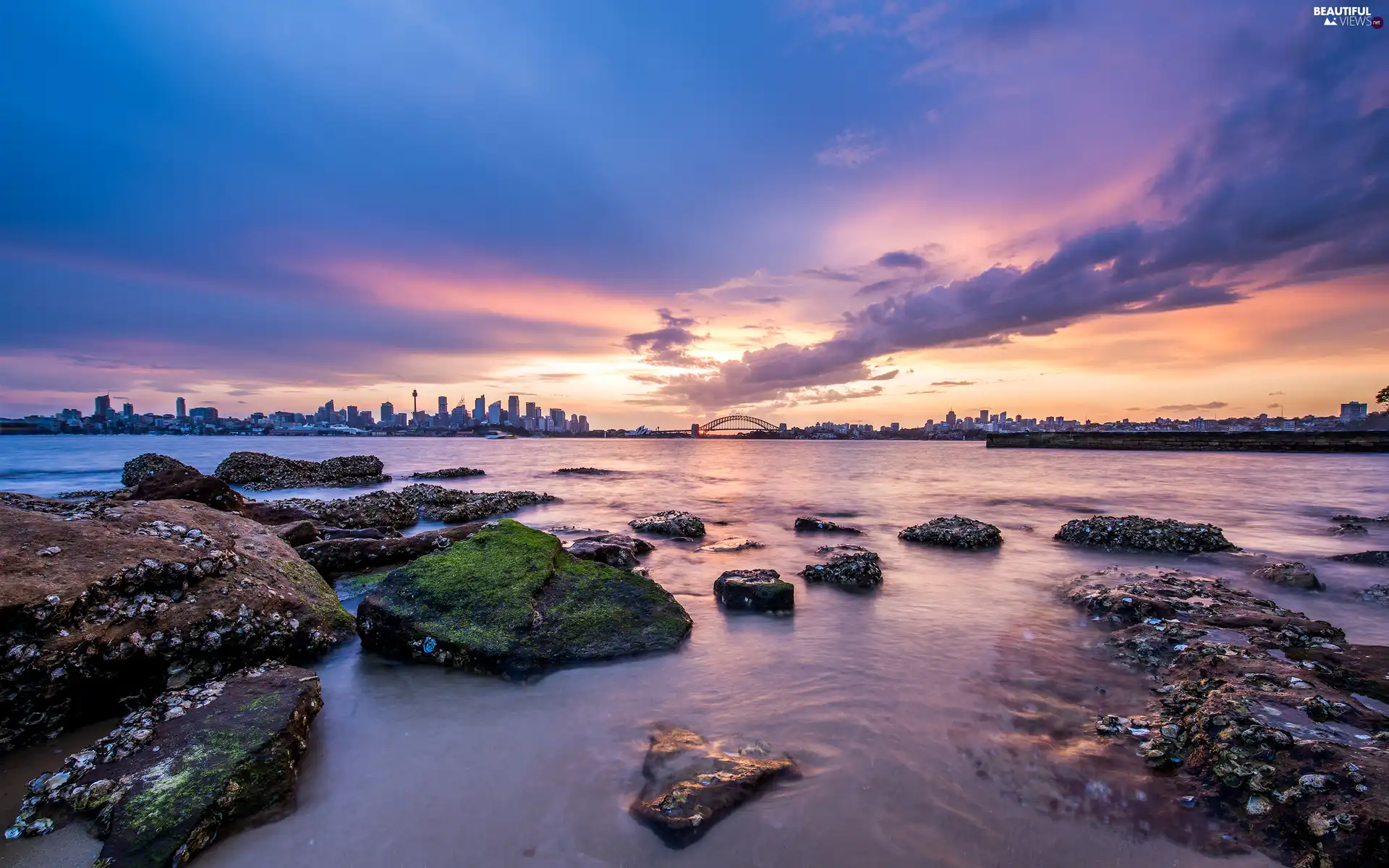 skyscrapers, Sydney, Port Jackson Bay, Sunrise, sea, Australia, Sydney Harbor Bay, clouds, bridge, Stones