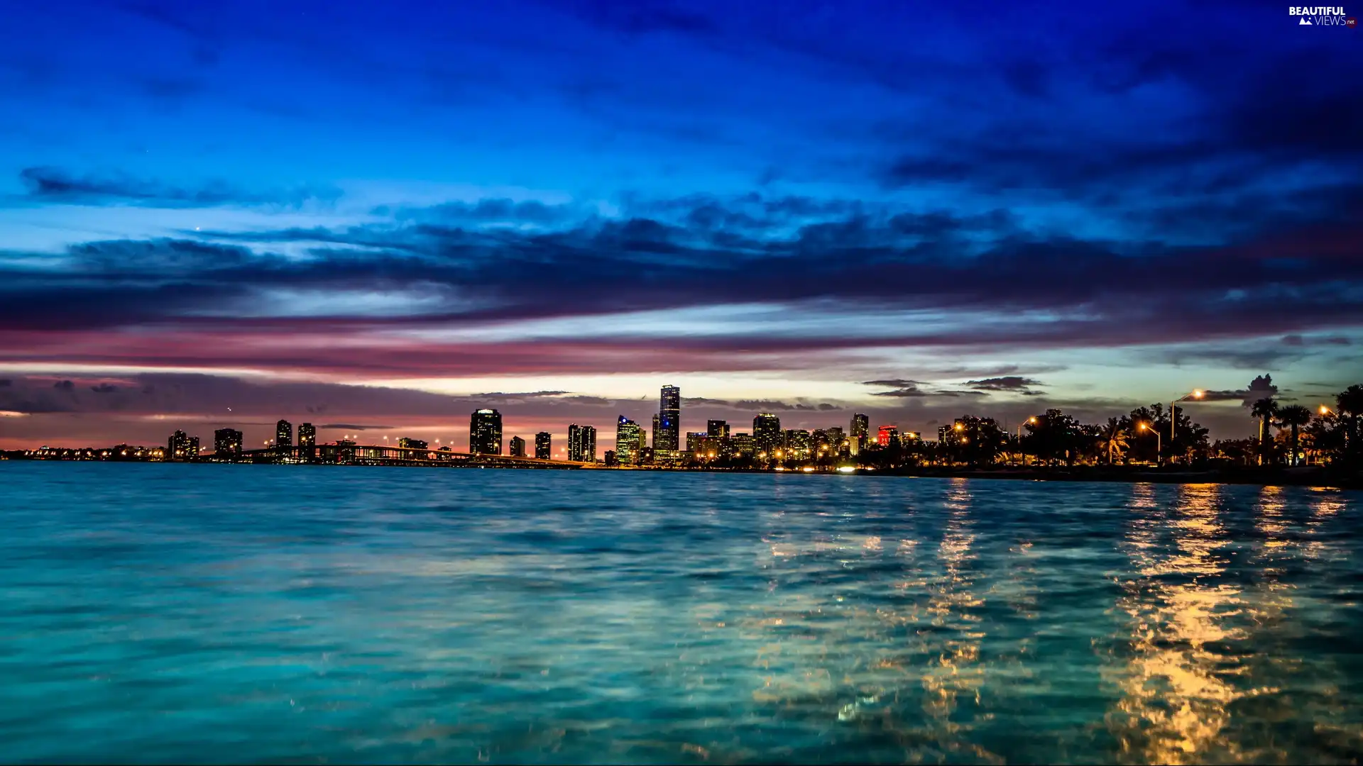 Town, night, skyscrapers, clouds, sea