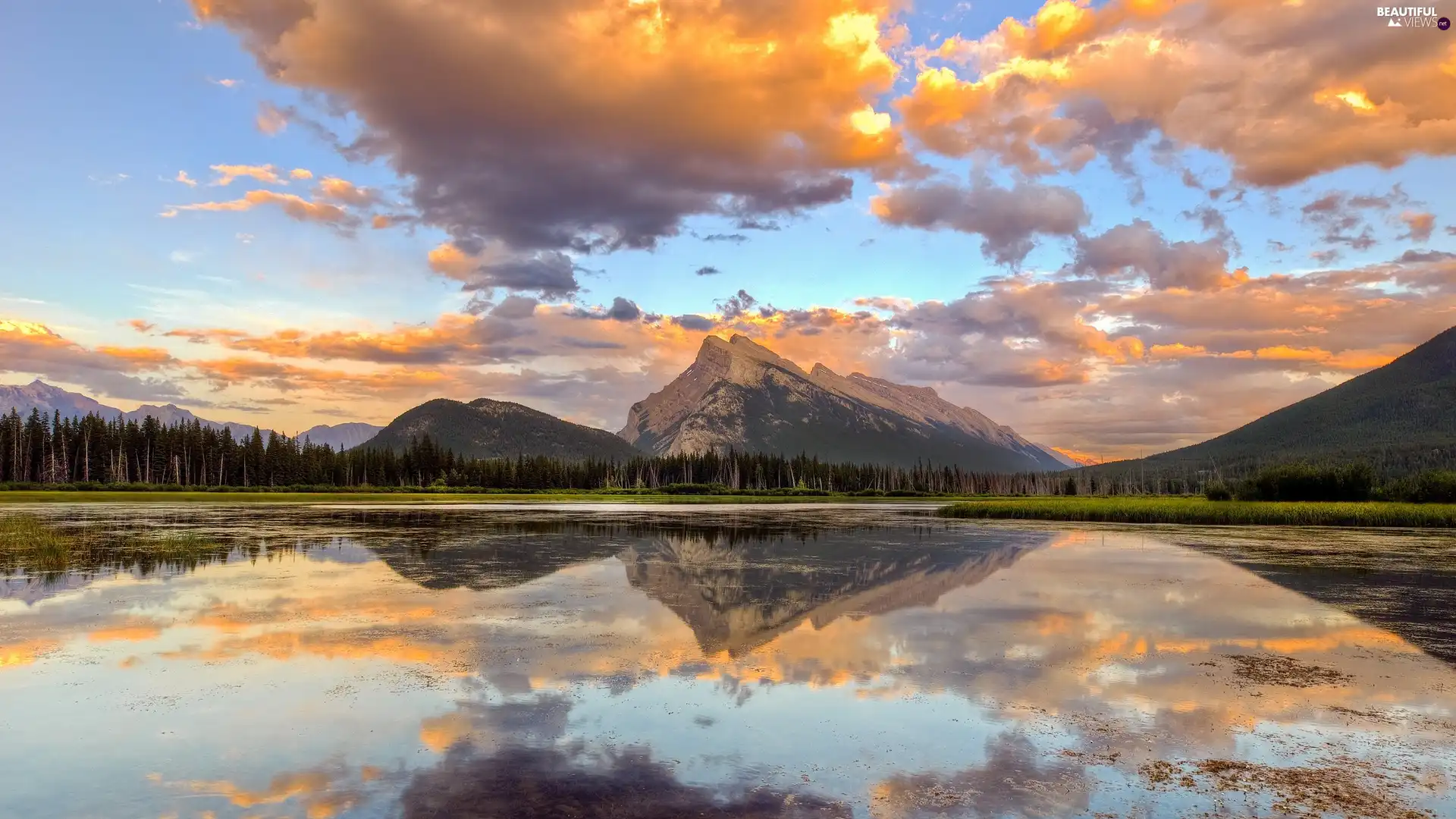 Mountains, clouds, water, woods